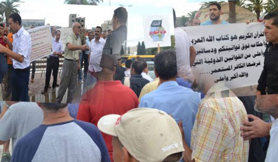 حزب التحرير/ ولاية تونس وقفة رمزية أمام مجلس النواب بعنوان  "أحكام الله لا تباع ولا تقايض بالقروض والصفقات الأجنبية"